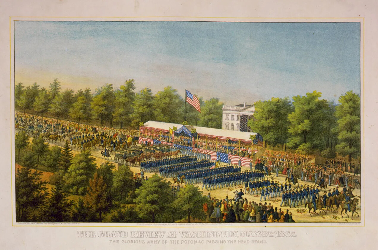 A colored drawing of groups of soldiers marching in straight lines, with several men on horseback. Large crowds of people watch the parade of soldiers from both sides of the road. Behind the soldiers is a large raised seating area that is decorated with many American flags. Behind the seating area is a large white building.