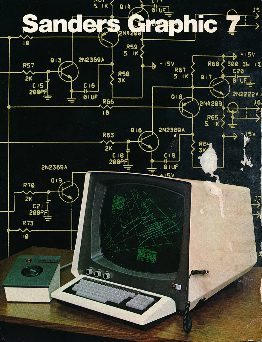 A colored poster showing a large white computer and keyboard. The background of the poster is black and is decorated with typed sets of code in yellow text. The title of the poster, located along the upper border, reads "Sanders Graphic 7."