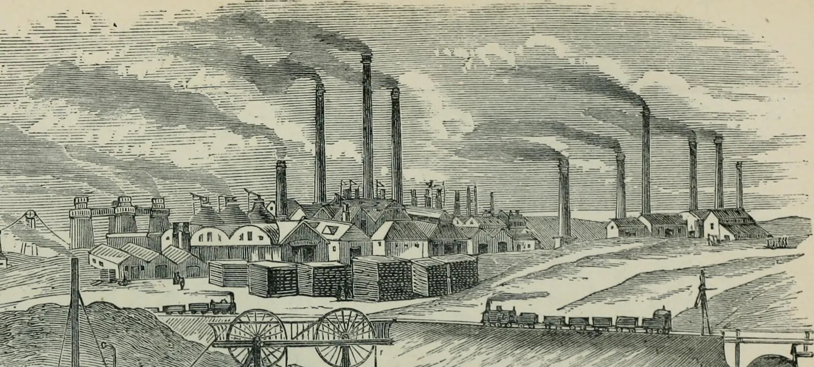 A black and white drawing of multi-storied buildings with tall smoke stacks. Smoke rises out of the smoke stacks. Two trains can be seen on train tracks along the bottom border of the drawing.