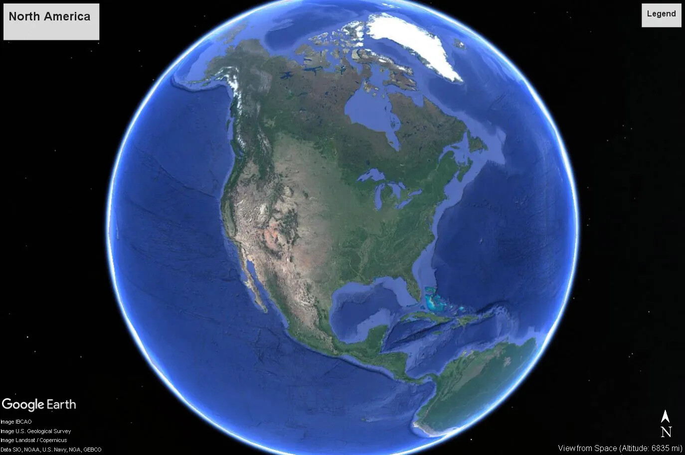 A colored screenshot of a circular Earth surrounded by the night sky from Google Earth. This image shows North America, and the top countries of South America. The sea is blue, and the continents are different shades of green.