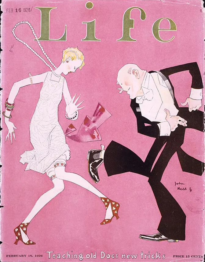 A poster with a pink background, showing a white man and woman dancing. The woman wears a long pearl necklace, a white dress, and red shoes. The man wears a black tuxedo, a white collared shirt, and large pointed black shoes. The title of the poster, located along the upper border, reads "Life."