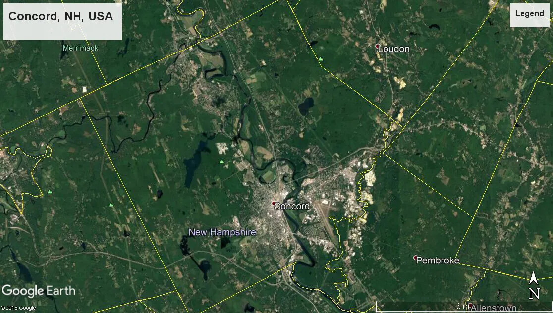 A colored birds-eye view map of Concord, NH, as well as parts of Loudon and Pembroke from Google Earth. The center of the image shows a large number of gray colored buildings congested in a small space, and the rest of the map is green. The boundaries of each of the towns are outlined in yellow.