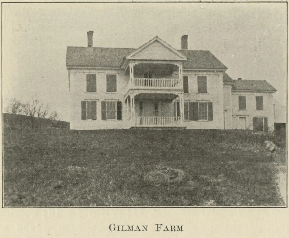A vertical document with black text on white paper on the top half of the document, and a black and white photograph of a large two-storied house. The front of the house has porches that stick out from the house on the first and second floors. The first floor has four windows with shutters, and the second floor has four windows without shutters. There is a large grassy yard in front of the house. Centered beneath the photograph are the words "GILMAN FARM."